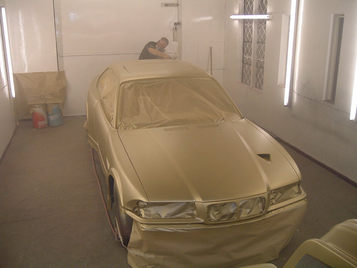 BMW painted in gold base